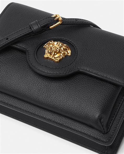 young versace black medusa embossed branded changing bag|Versace la medusa crossbody.